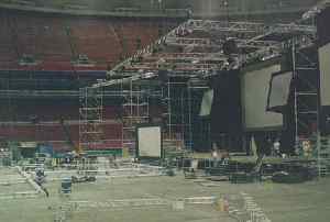 (Photo: another 
couple of hours have passed. Lighting trusses and stage platforms are 
beginning to take shape)